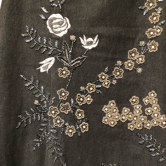 Dark denim stud and embellished skirt.  A-line - Picture 4 of 12